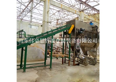 袋裝石英粉自動破包機(jī)助力企業(yè)發(fā)展